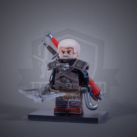 Toy figure of a Witcher with armor and two swords on a gray background